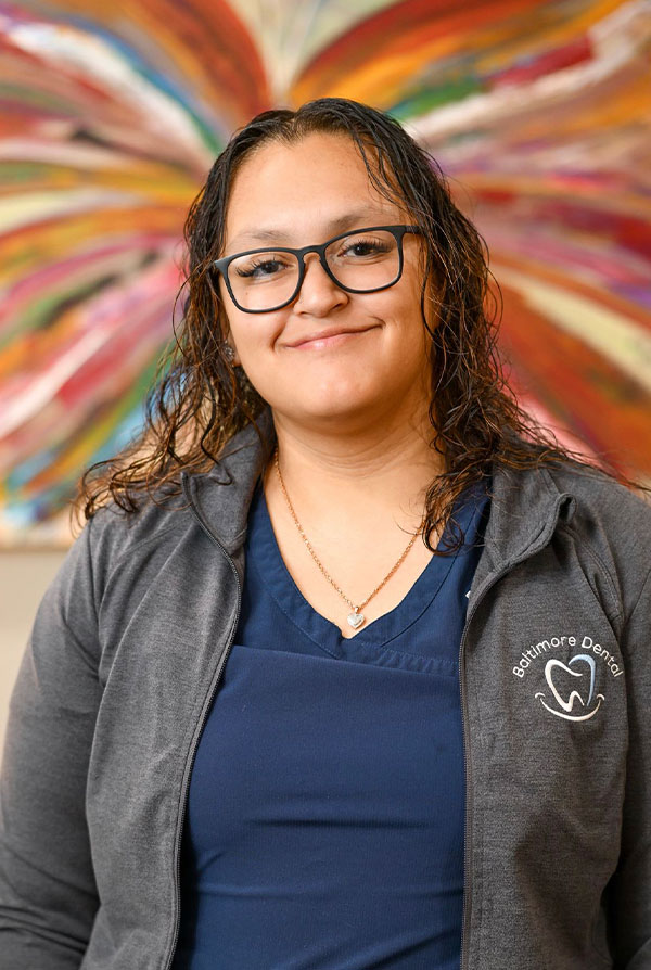 The image shows a person posing for the photograph.